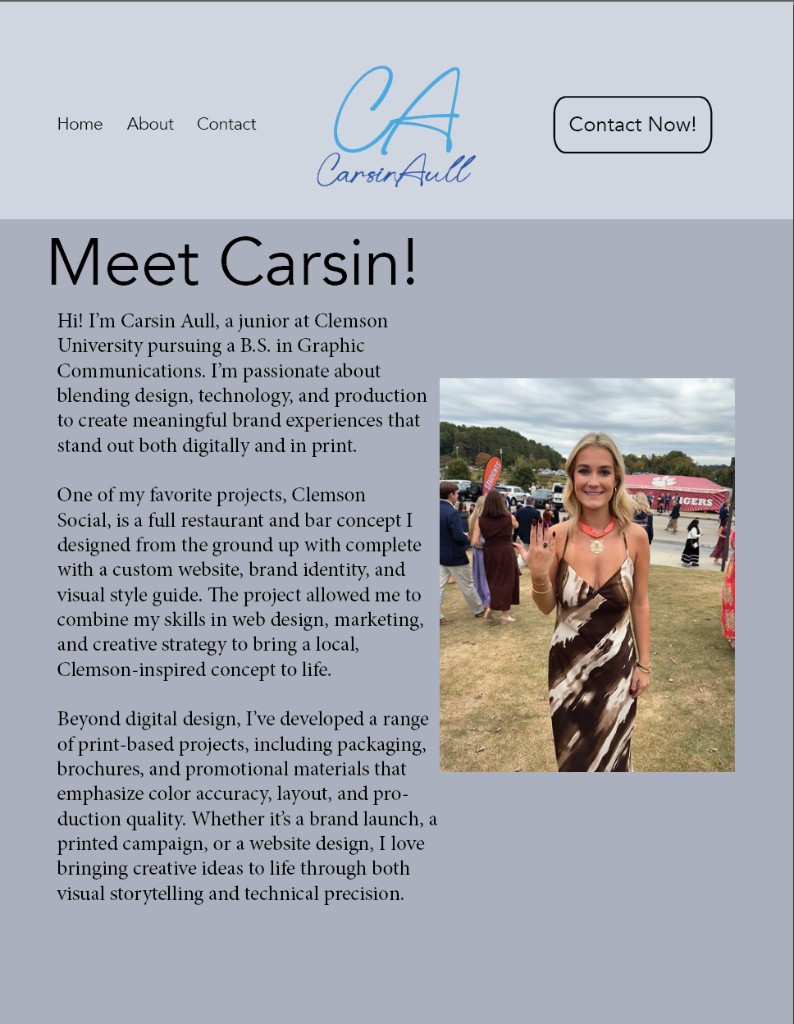 Carsin Aull outdoors at an event, smiling